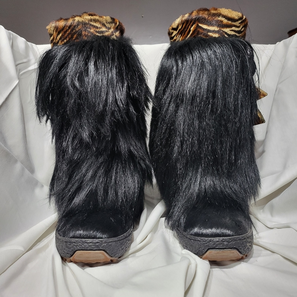 Oscar black fur boots.